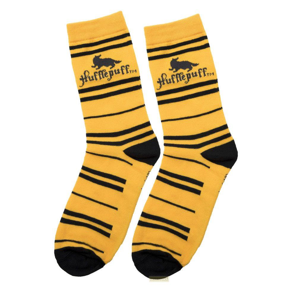 Gelbe Socken mit schwarzen Streifen und Hufflepuff-Logo.
