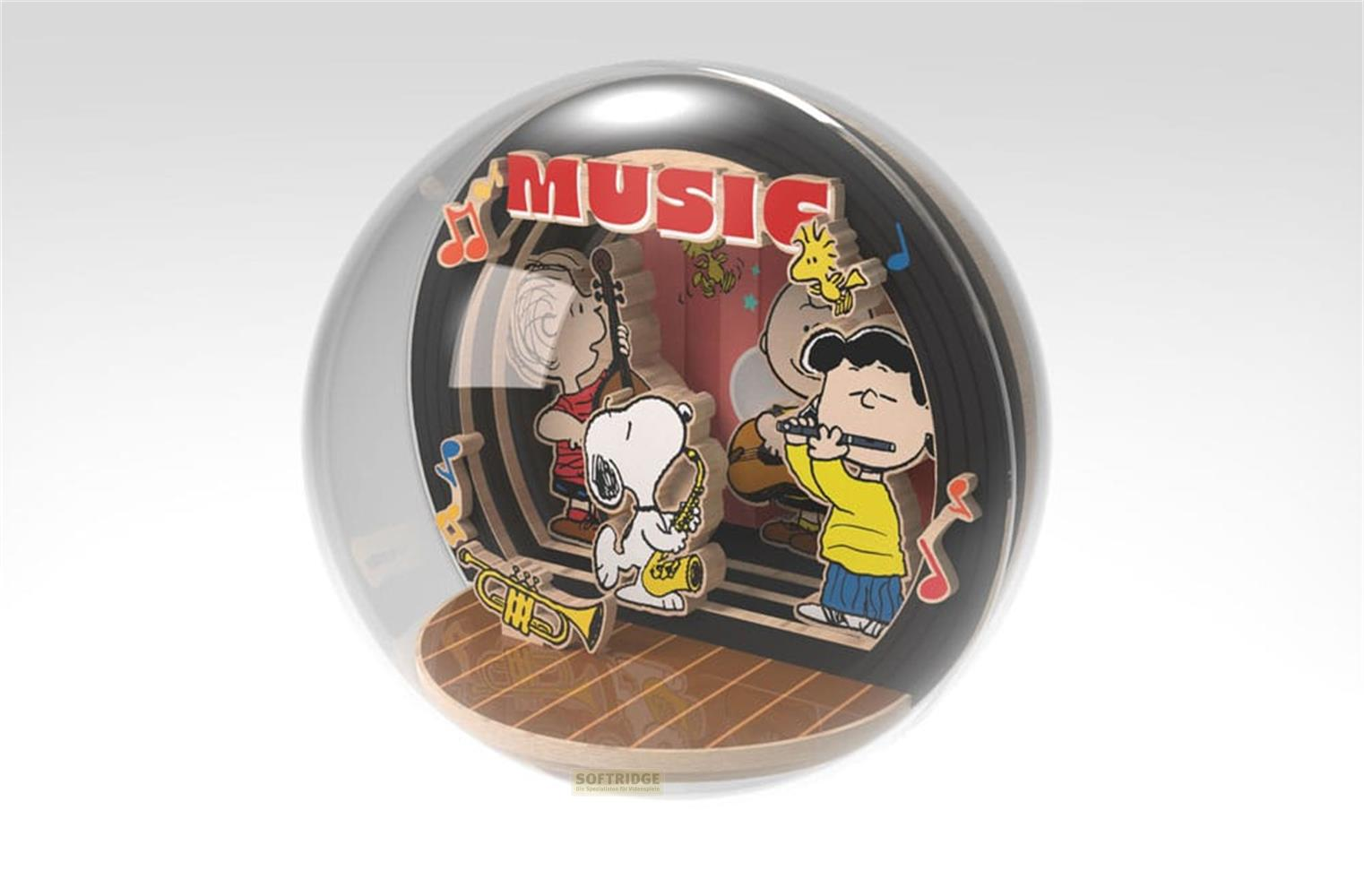 Personnages Peanuts jouant de la musique dans une sphère de verre.
