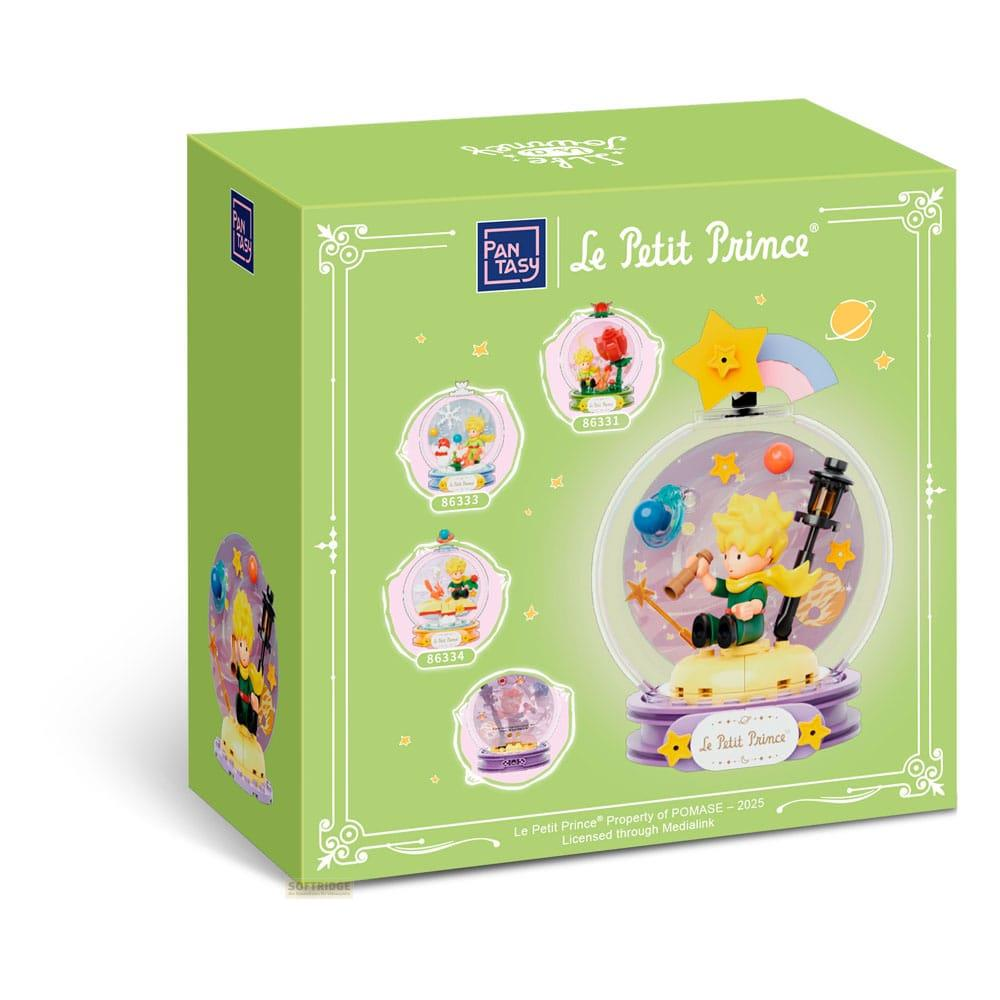 Verpackung mit Le Petit Prince-Motiv und Schneekugel-Figuren.
