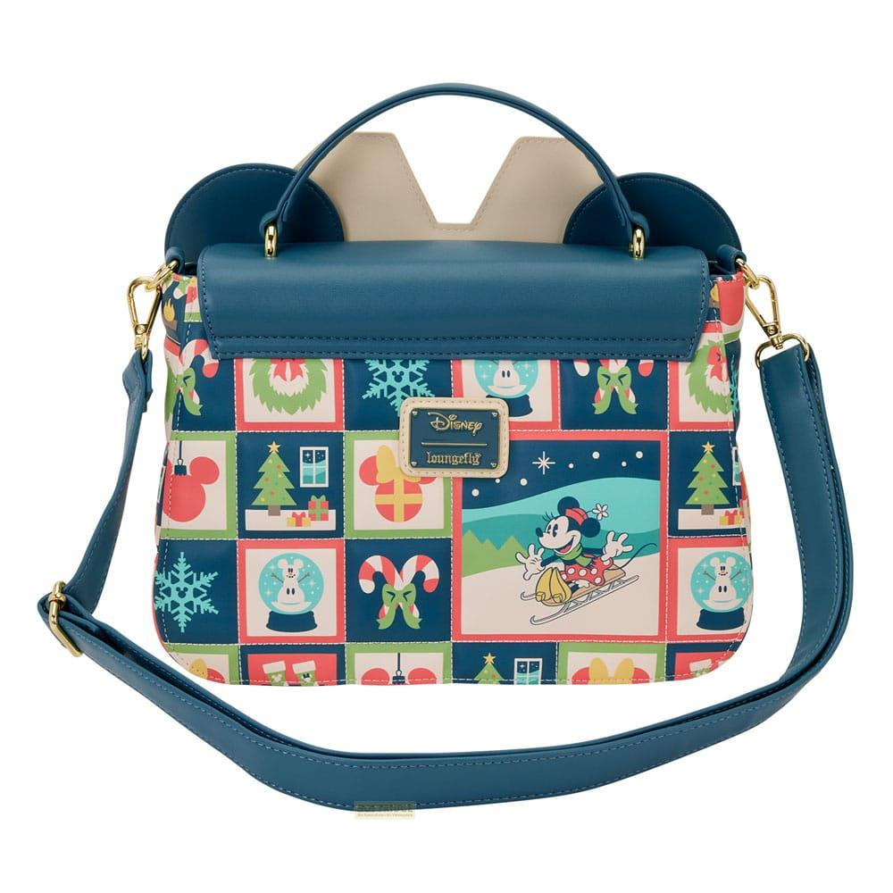 Un bolso con motivos navideños de Disney. Minnie Mouse esquía. Azul oscuro.