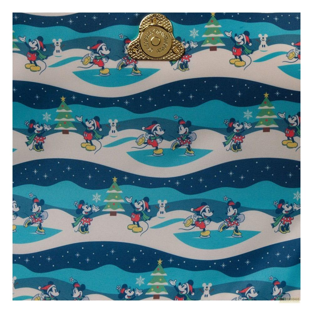 Mickey y Minnie patinando sobre hielo con árboles de Navidad y nieve.