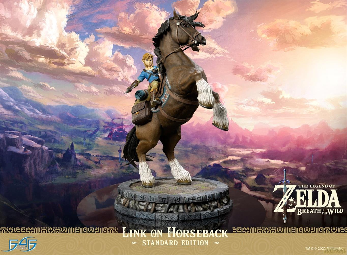 Link sur un cheval brun cabré sur ses pattes arrière devant un paysage montagneux.