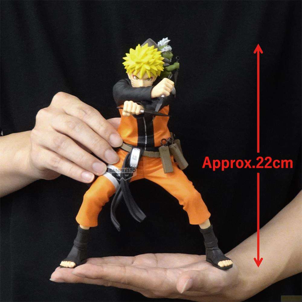 Figura de Naruto con traje naranja, sosteniendo espada, aprox. 22cm.