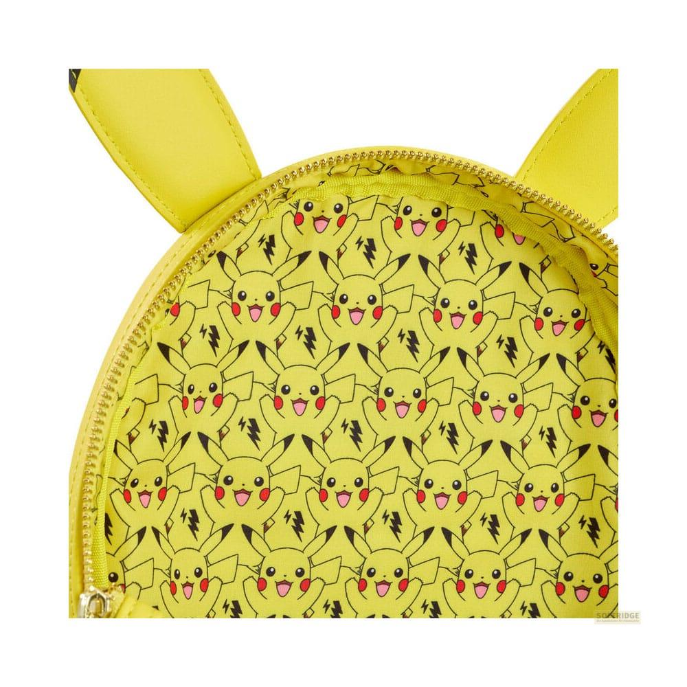 Una mochila amarilla con un patrón de caras de Pikachu y rayos.