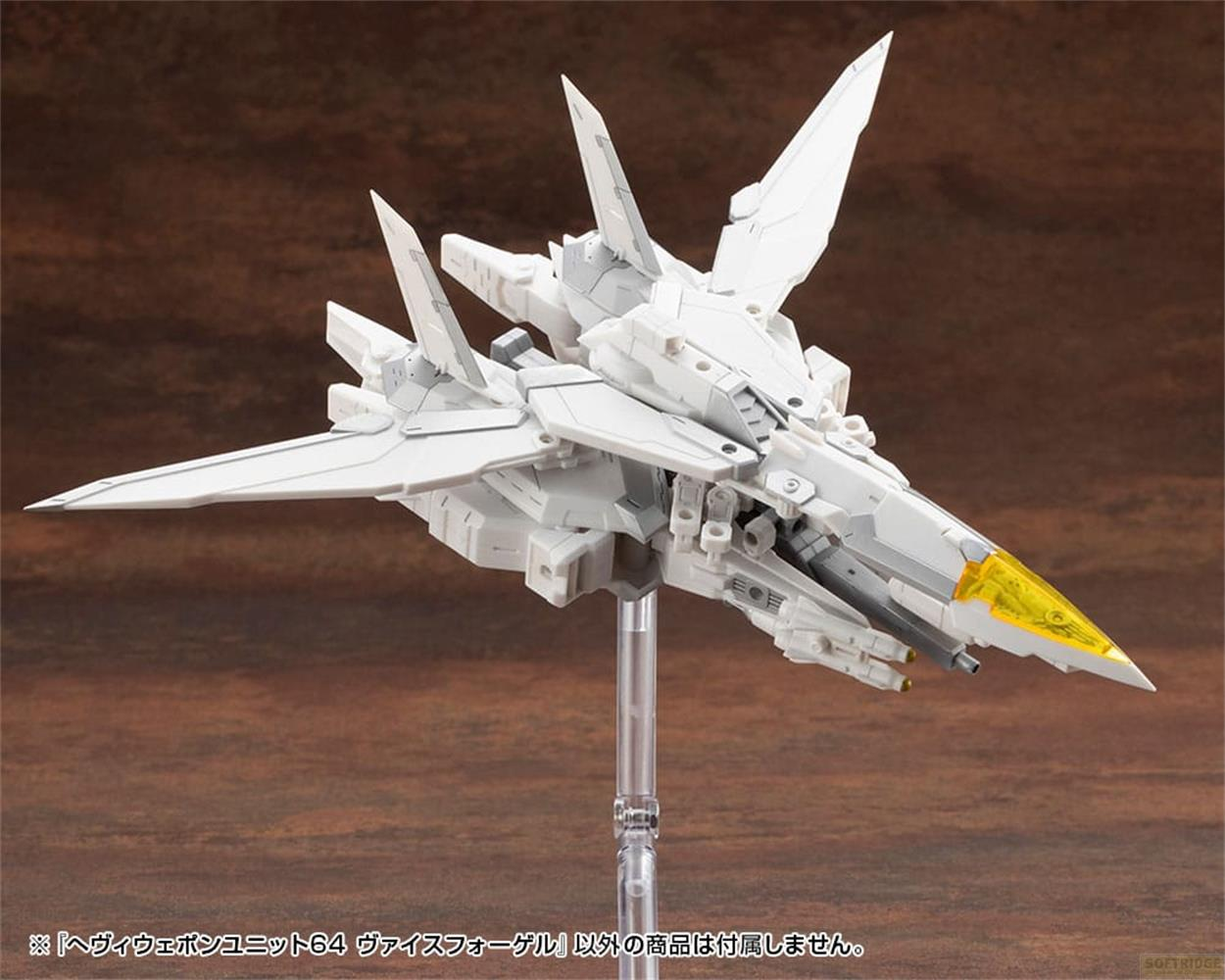 Modèle blanc d'un avion de chasse futuriste à nez jaune, sur un support.