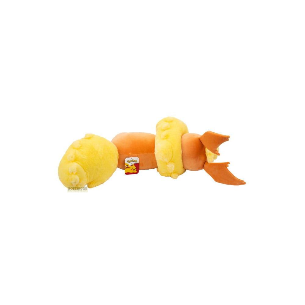 Un personnage en peluche jaune et orange avec une étiquette "Pokemon".