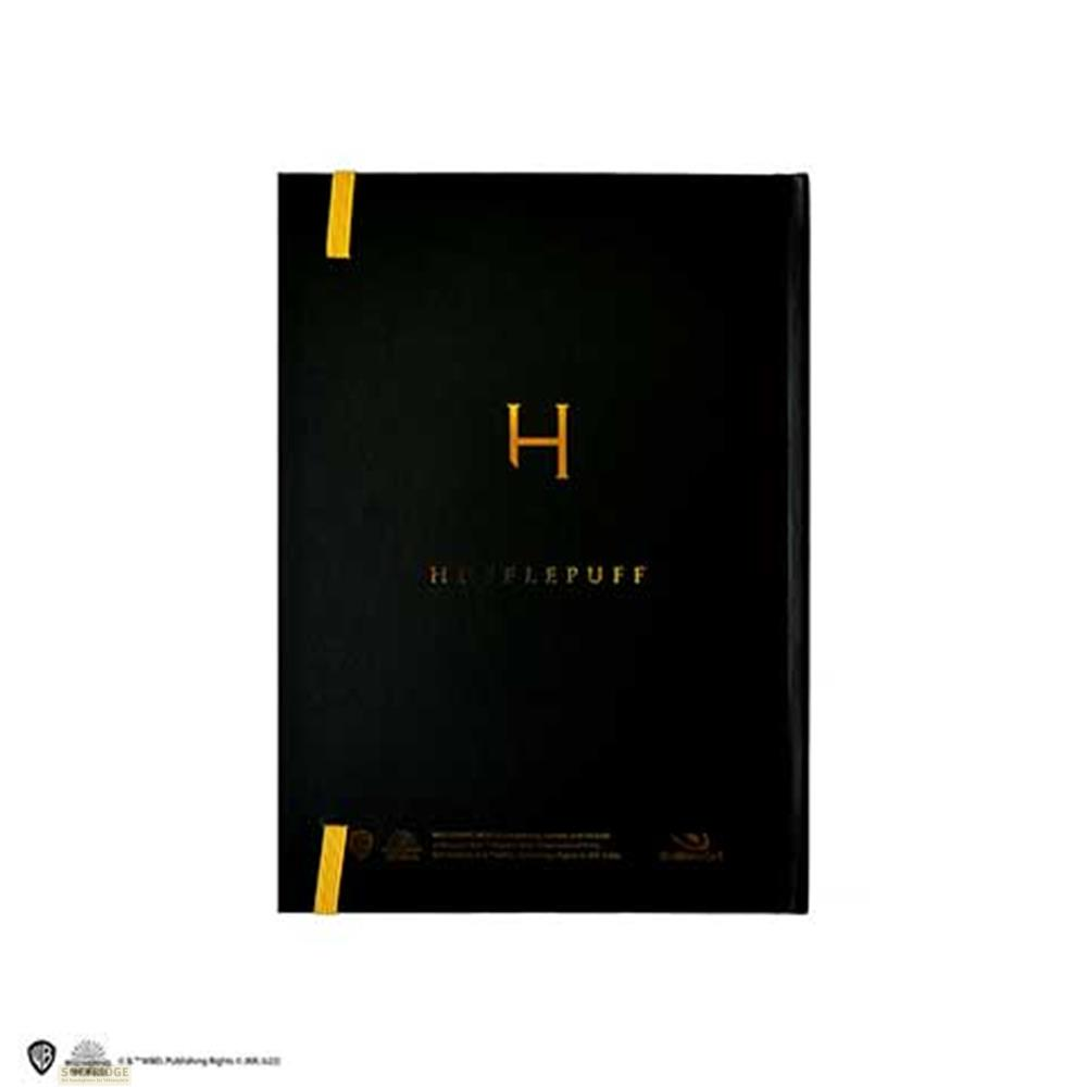 Schwarzes Buch mit goldenem H und Hufflepuff-Schriftzug.