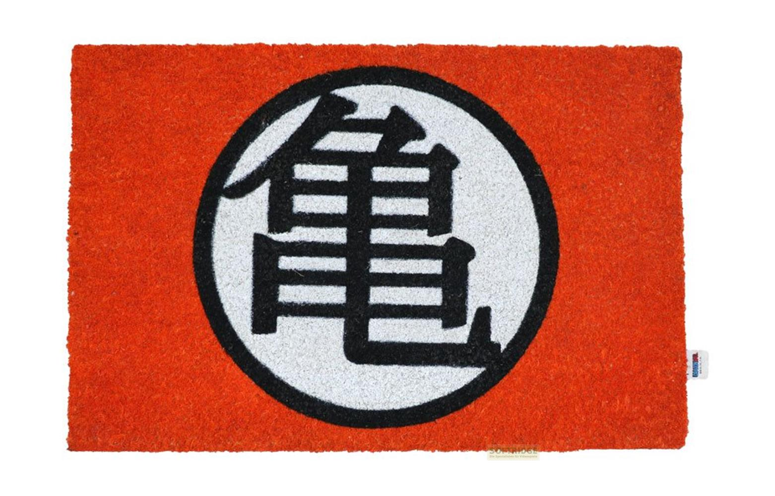 Eine orange Fußmatte mit einem schwarzen Kreis und einem weißen Kanji-Symbol.