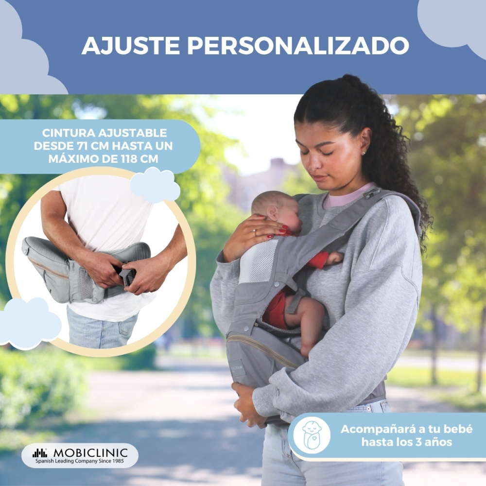 Mujer con bebé en portabebés; hombre ajusta el cinturón.