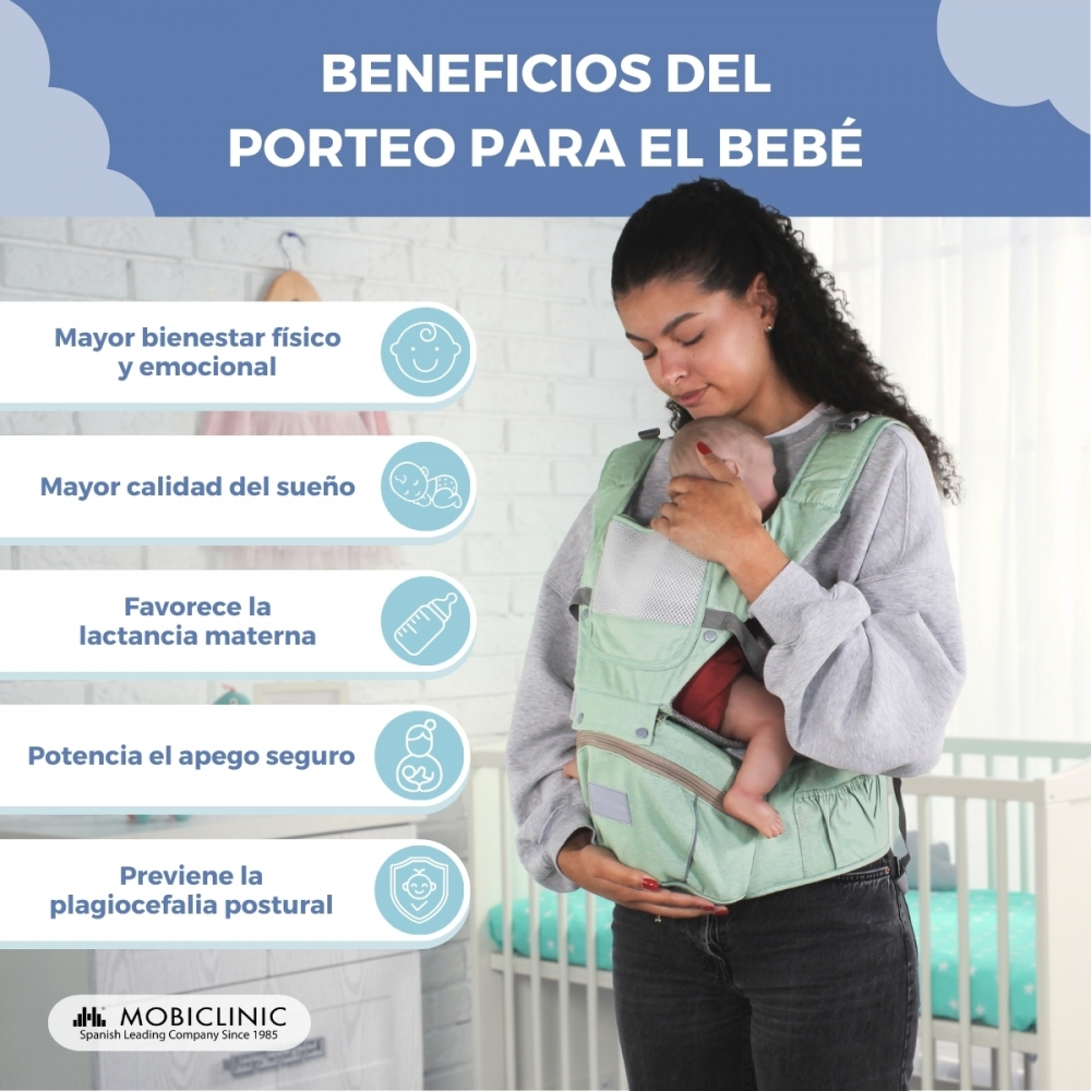 Una mujer lleva un bebé en un portabebés verde claro frente a una cuna. El texto enumera beneficios.
