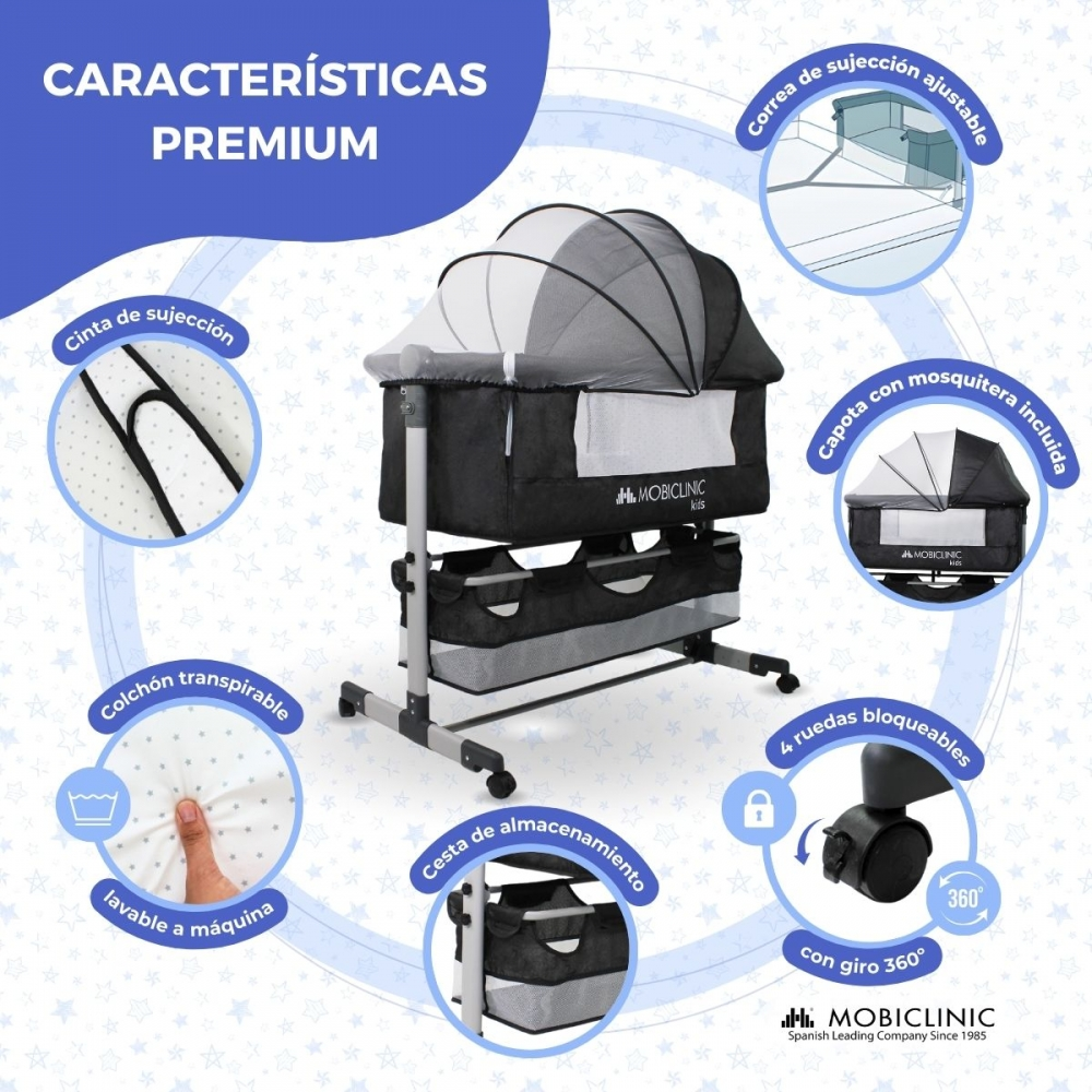 Una cuna con características: correas, mosquitera, almacenamiento y ruedas.