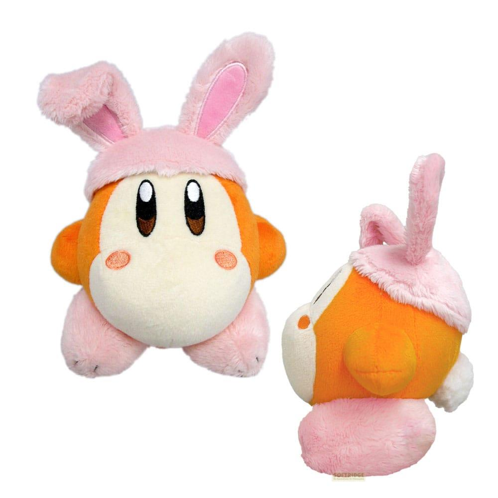Un peluche naranja con sombrero de conejito rosa y detalles rosados.