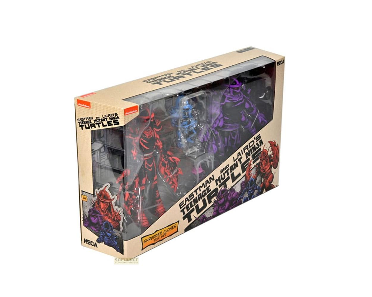 Caja con figuras de acción de Teenage Mutant Ninja Turtles en rojo, azul y morado.
