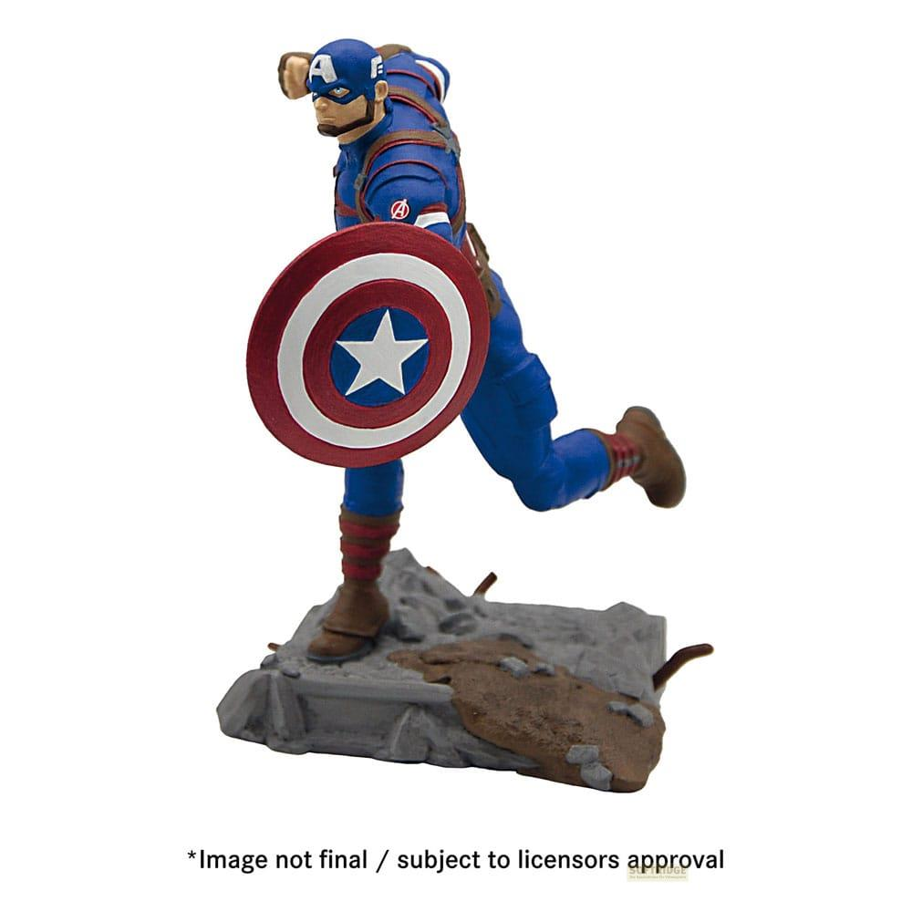 Figura del Capitán América con uniforme azul y escudo, sobre terreno rugoso.