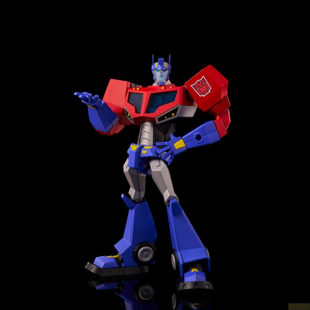Figura di Optimus Prime rossa, blu e grigia su sfondo nero.