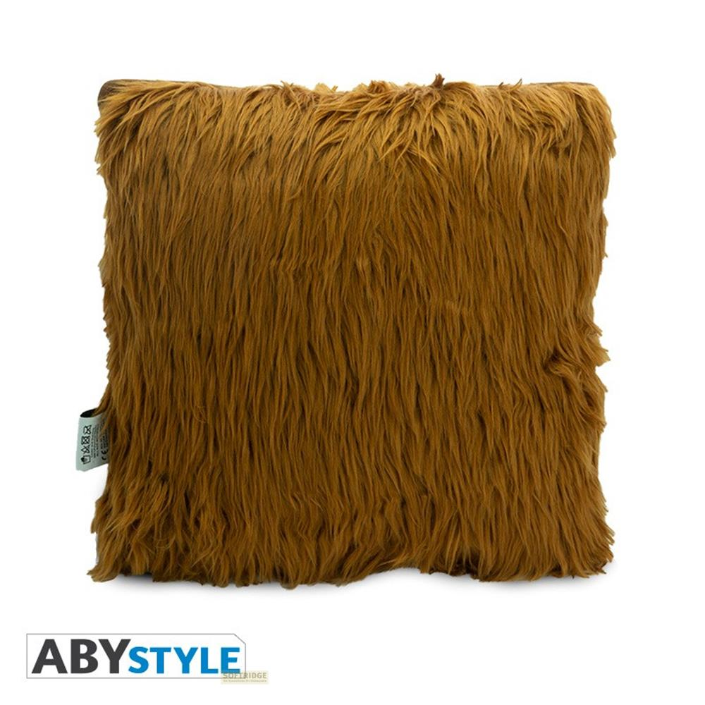 Ein braunes, flauschiges Kissen mit langen Haaren.