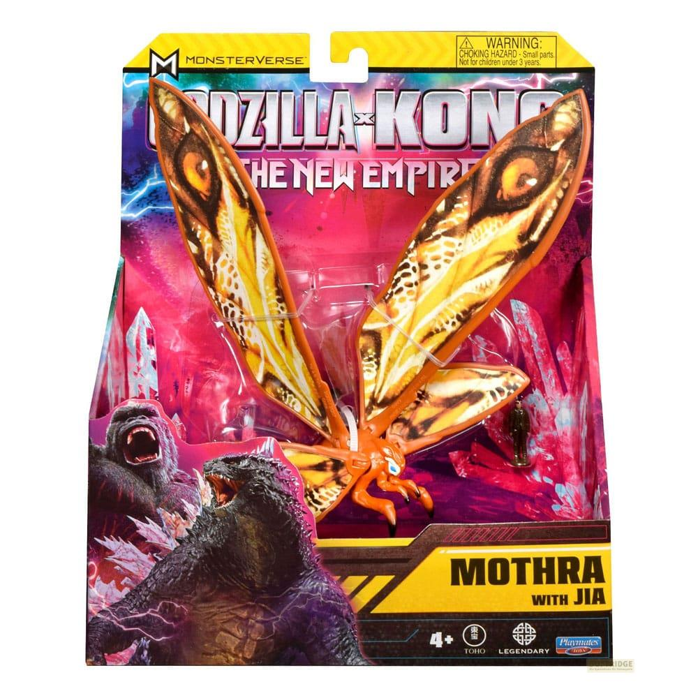 Action figure di Godzilla e Kong in scatola con Mothra in primo piano.