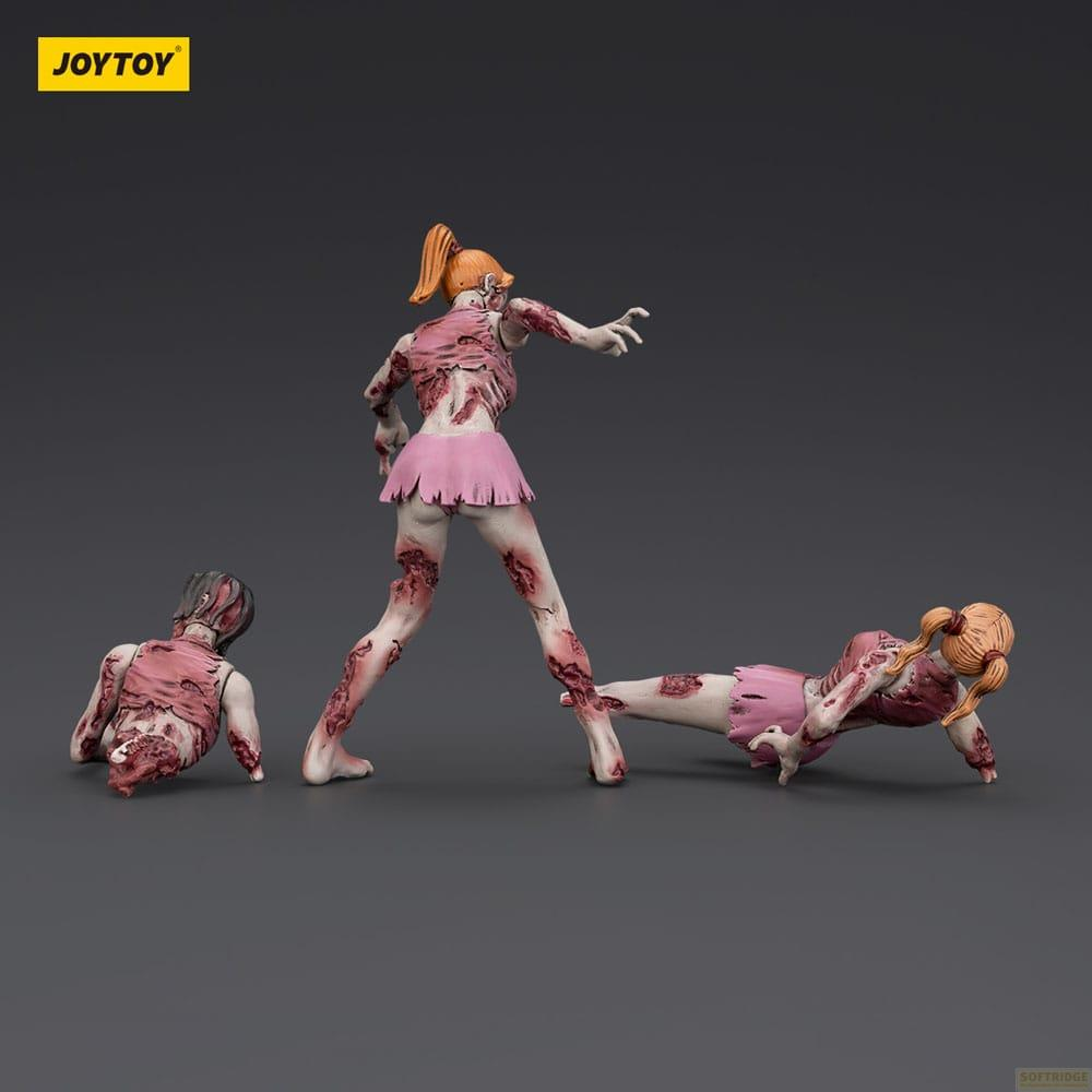 Tre figure di zombie con gonne rosa su sfondo grigio.