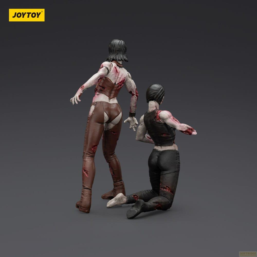 Due figure di zombie femminili con vestiti strappati su sfondo grigio.