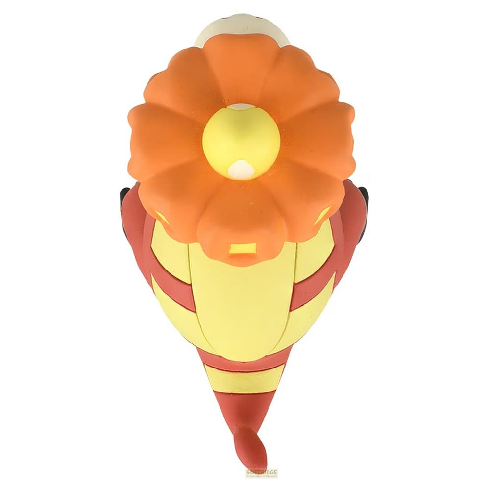 Eine gelbe Figur mit orangefarbenem Blumenkopf und roten Akzenten.