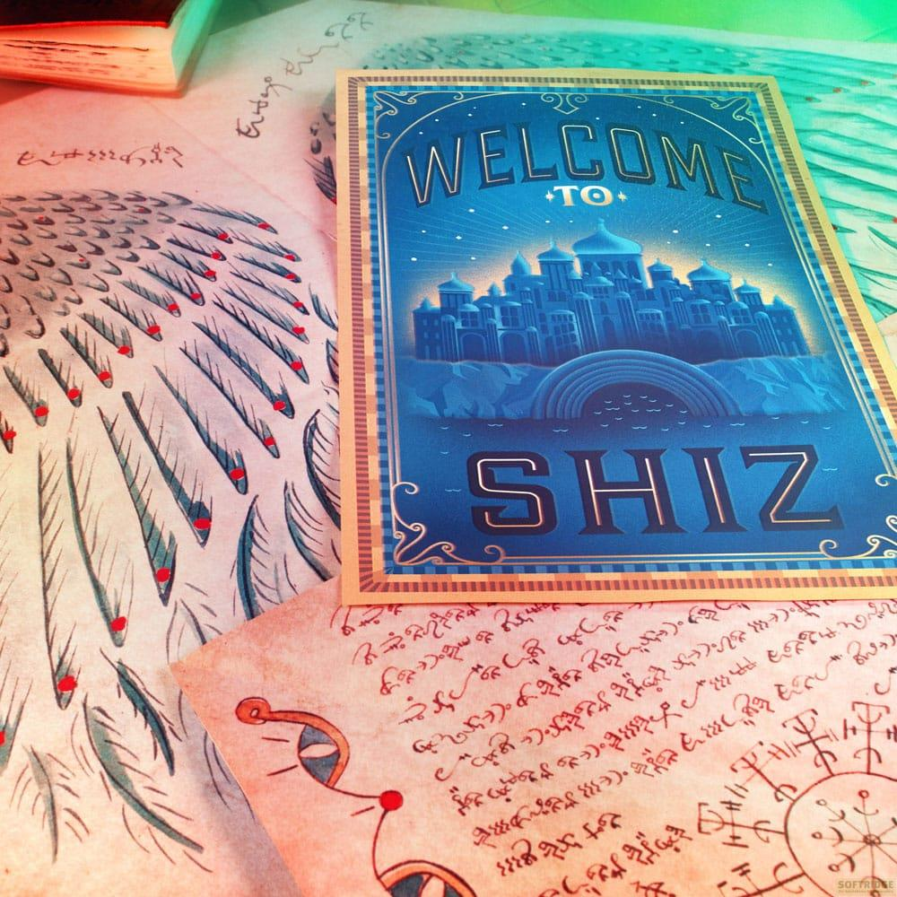 Bienvenido a Shiz: Un póster de bienvenida azul con un horizonte urbano sobre un puente.