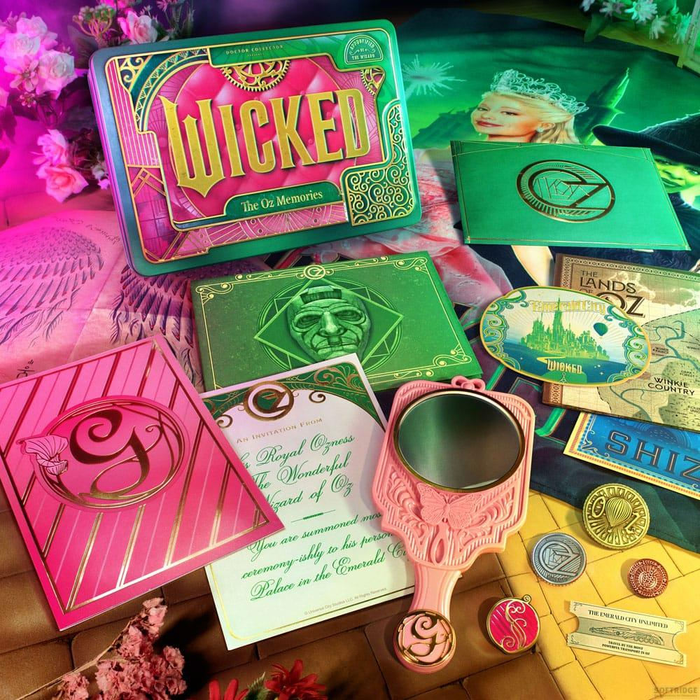 Mercancía de Wicked con temas de Oz, invitaciones, espejo y monedas.