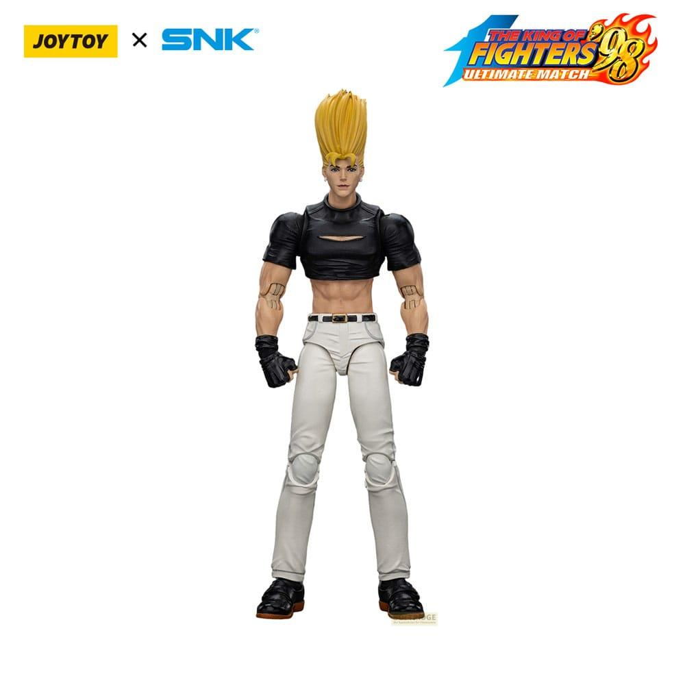 Action figure maschile con capelli biondi, top nero e pantaloni bianchi in piedi.