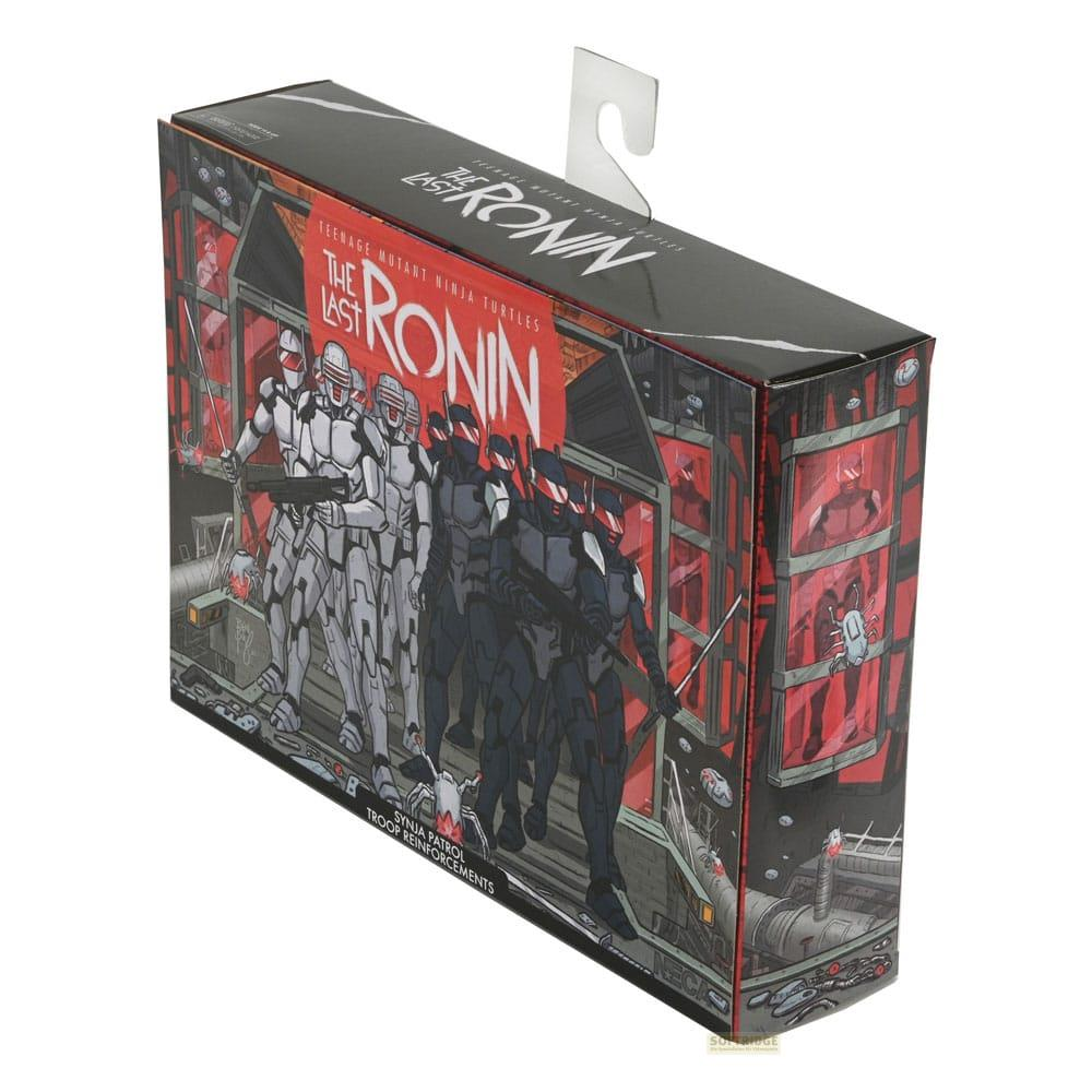 Caja de figuras de acción de Las Tortugas Ninja: El Último Ronin. Figuras blancas y negras.