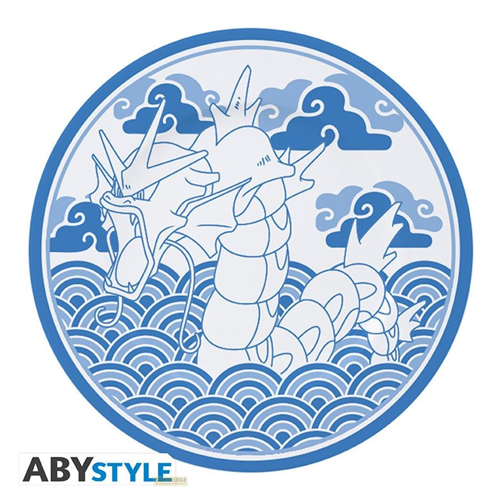 Un dragon bleu avec des vagues et des nuages dans un cercle.