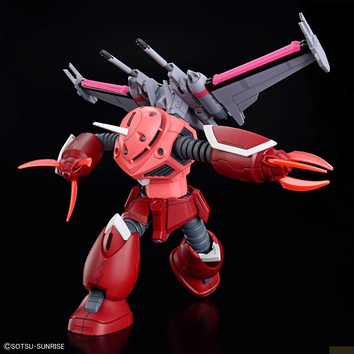 Ein roter und rosafarbener Mech mit Krallenarmen und Raketenrucksack.