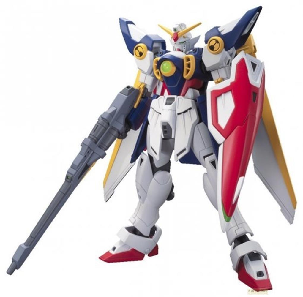 Un robot Gundam blanc, bleu et rouge tenant un fusil et un bouclier.