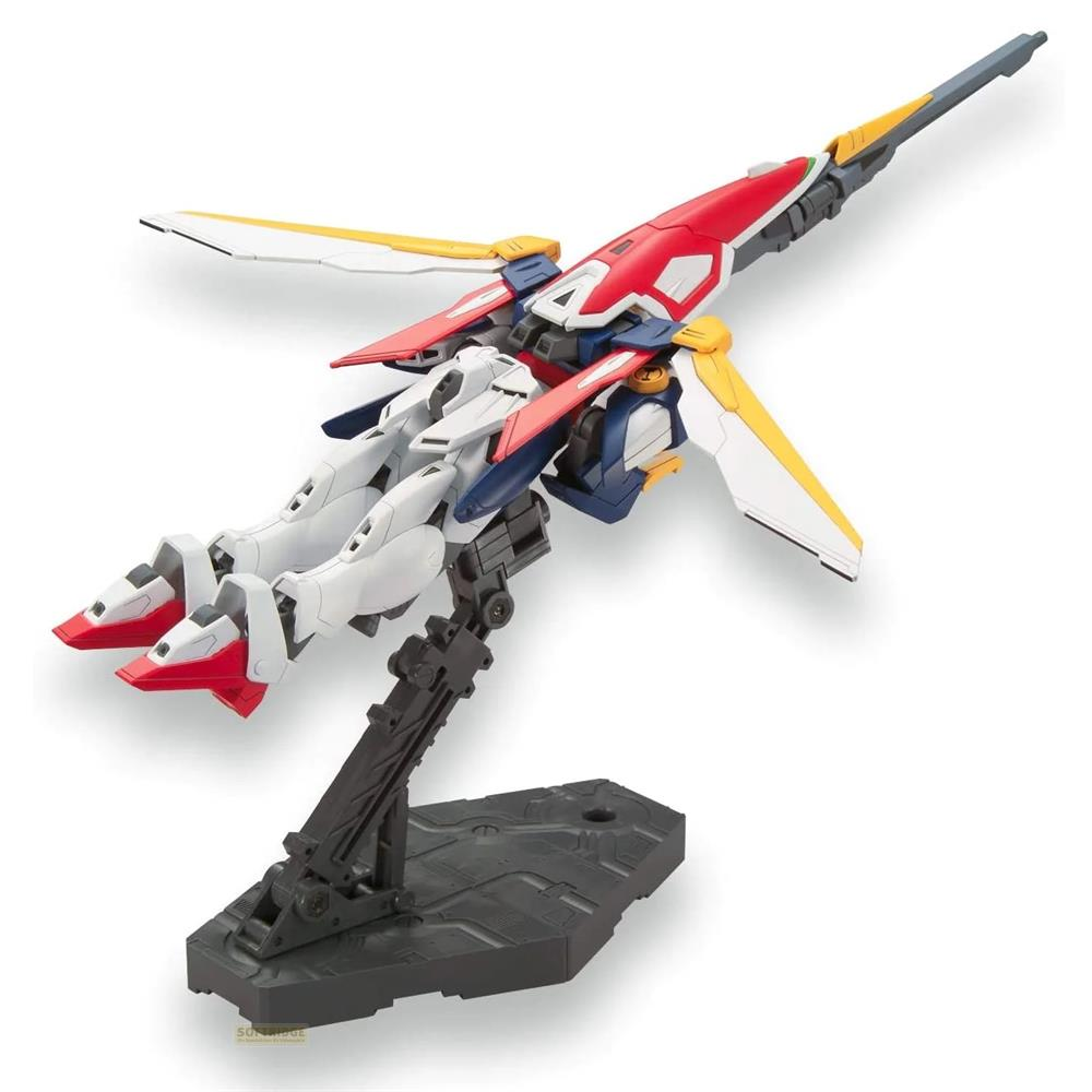 Maquette de robot blanche, rouge et bleue sur un socle noir.