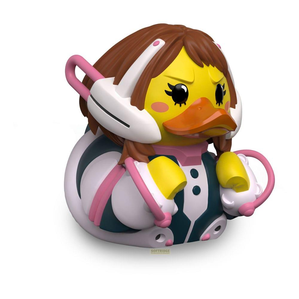 Un pato de goma amarillo con pelo castaño, auriculares y traje.