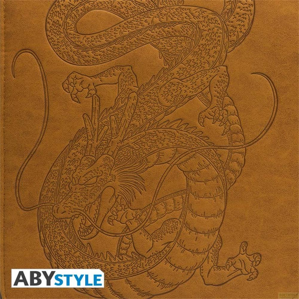 Une figure de dragon détaillée en relief marron sur une surface semblable au cuir.