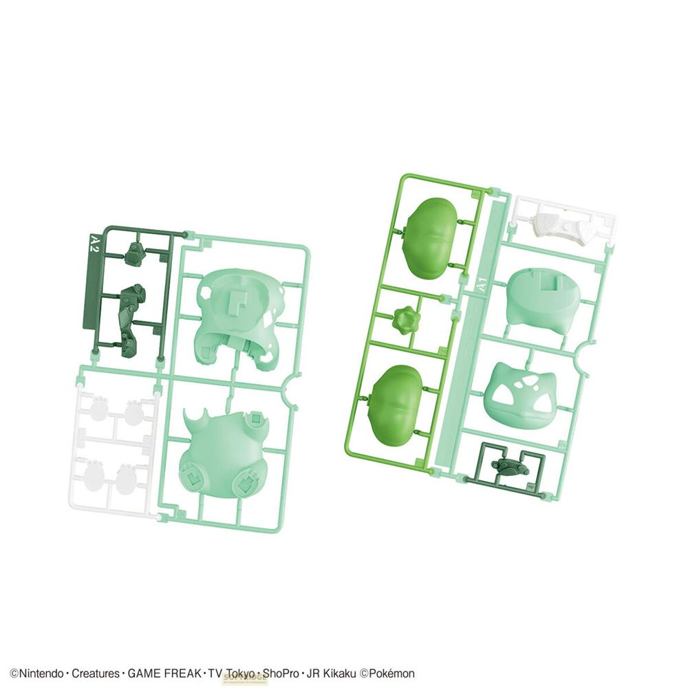 Deux grappes de plastique avec des pièces pour un modèle. Vert et blanc.