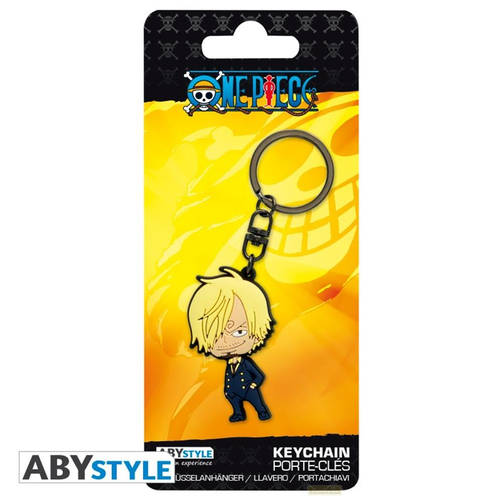 Un llavero de One Piece con Sanji con traje azul oscuro sobre fondo amarillo.