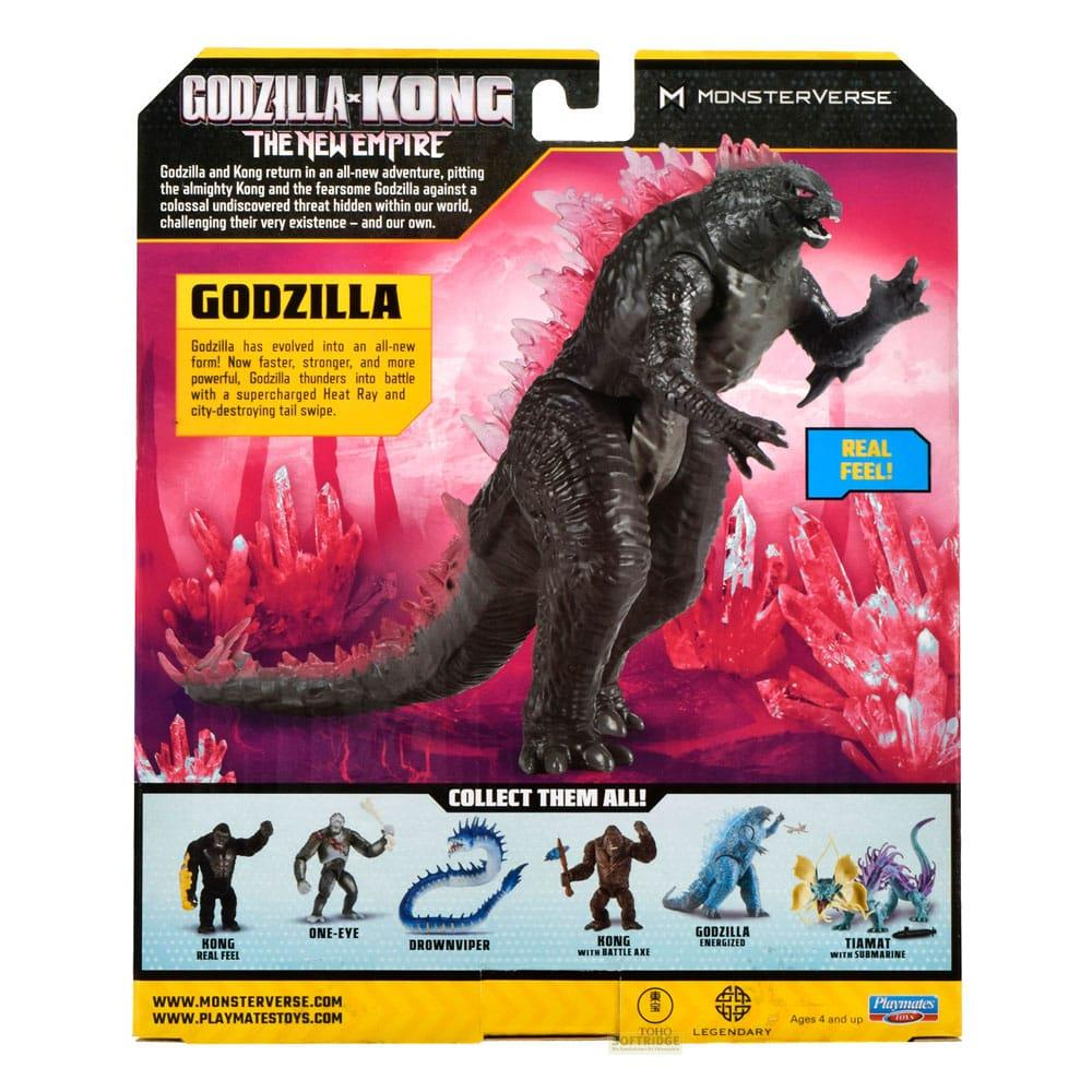 Confezione giocattolo Godzilla con figura di Godzilla e altri mostri.