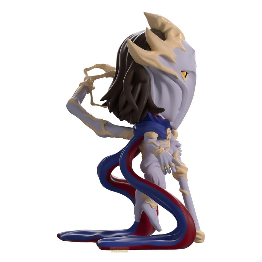 Una figura con cuerpo gris, pelo castaño y cuernos amarillos.