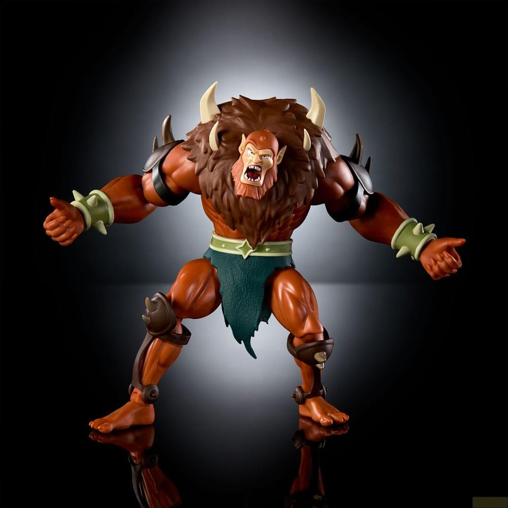 Action figure di una creatura arancione e muscolosa con pelliccia marrone e corna.