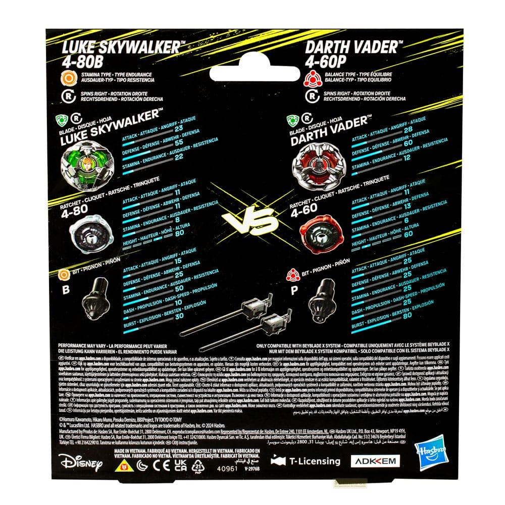 Emballage avec jouets Beyblade X Luke Skywalker et Dark Vador. Détails sur attaque, défense et endurance.