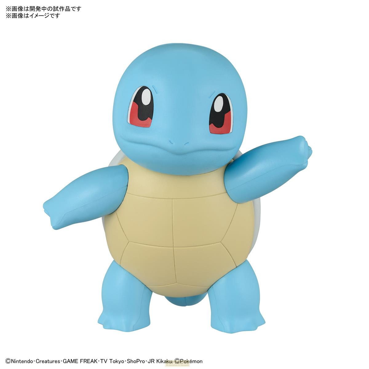 Une figurine bleue de Carapuce avec une carapace beige et des yeux rouges.