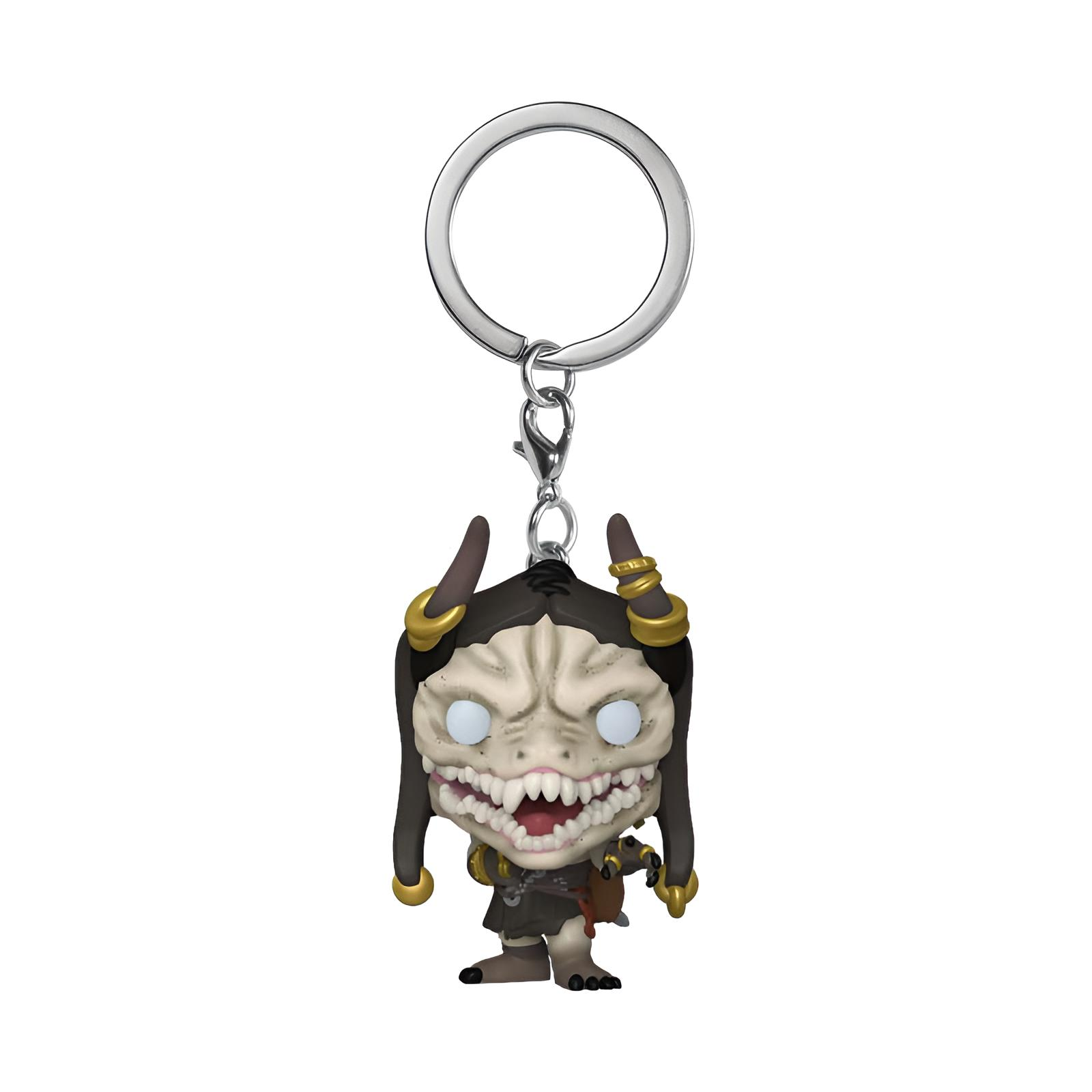 Ein Schlüsselanhänger mit einer gruseligen Figur mit Hörnern und goldenen Ringen.