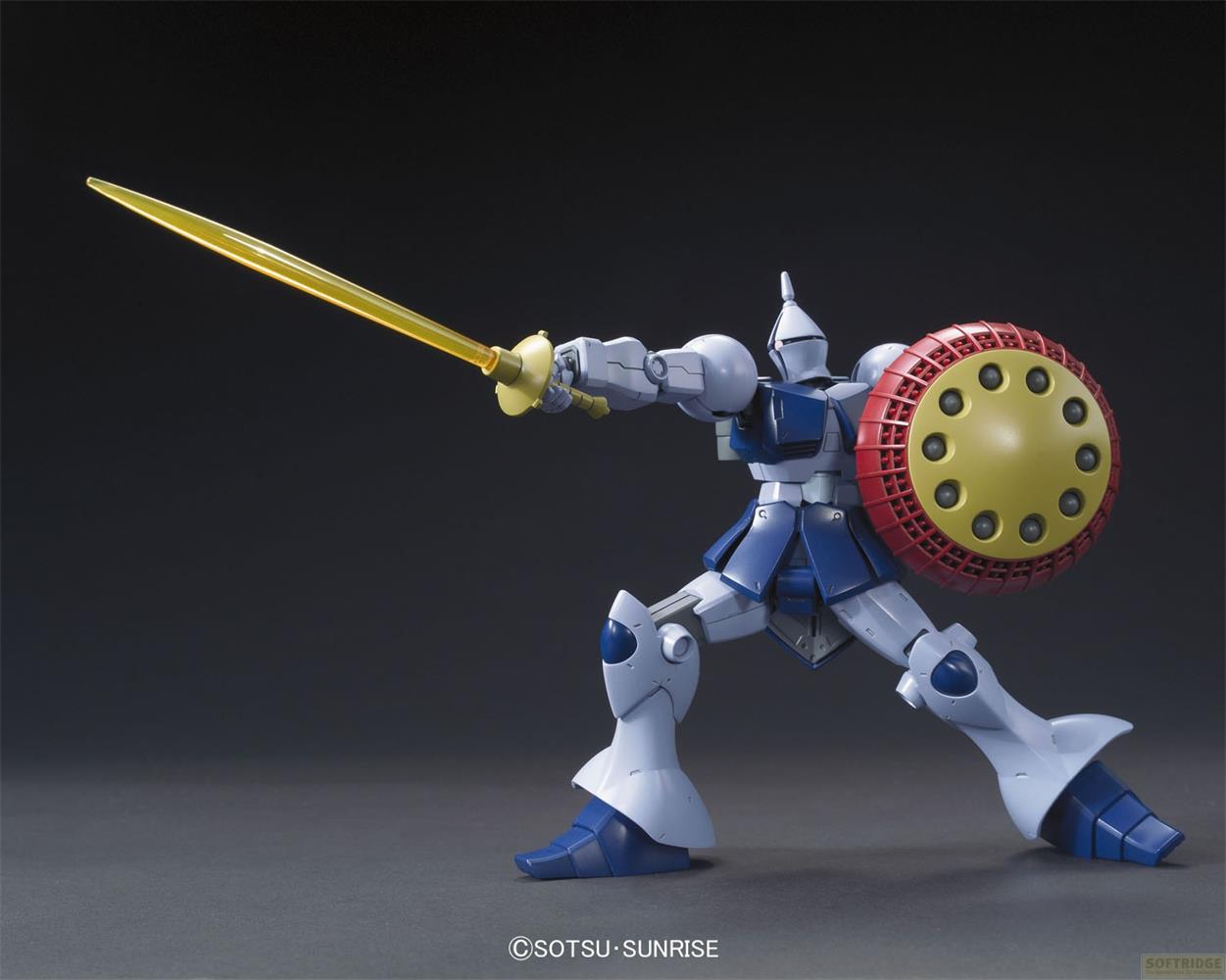 Un robot bleu et blanc avec épée jaune et bouclier rouge tient une pose.