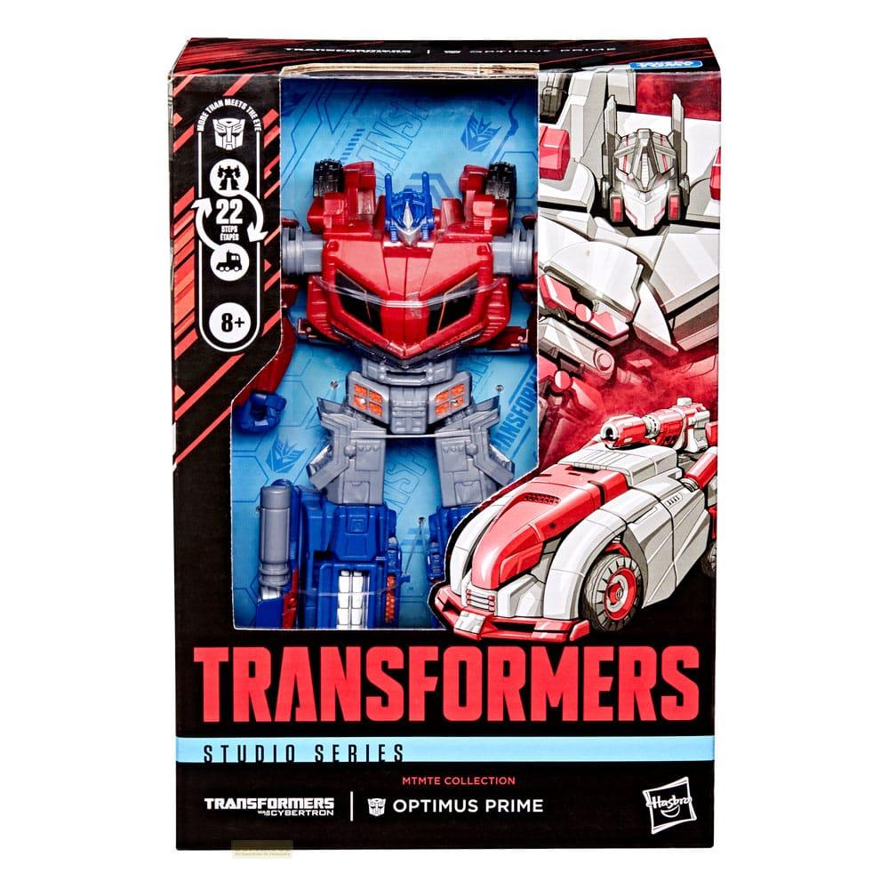 Juguete Optimus Prime en caja, rojo, blanco y azul.