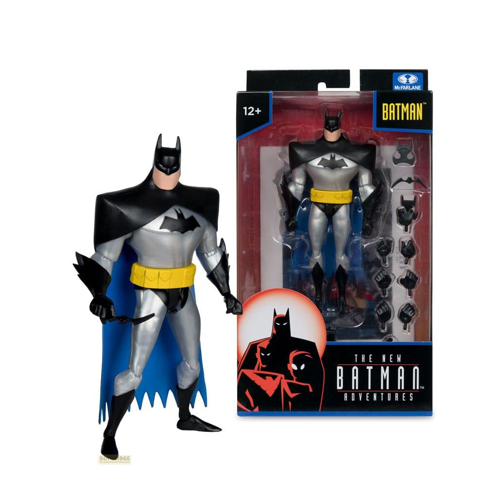 Action figure di Batman in tuta argentata e mantello blu con accessori.
