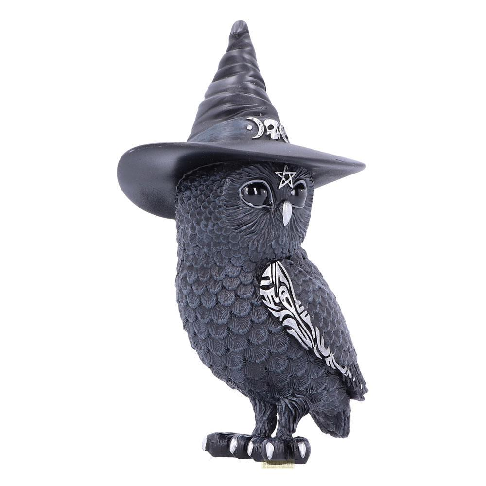 Eine dunkle Eulenfigur mit Hexenhut und silbernen Verzierungen.