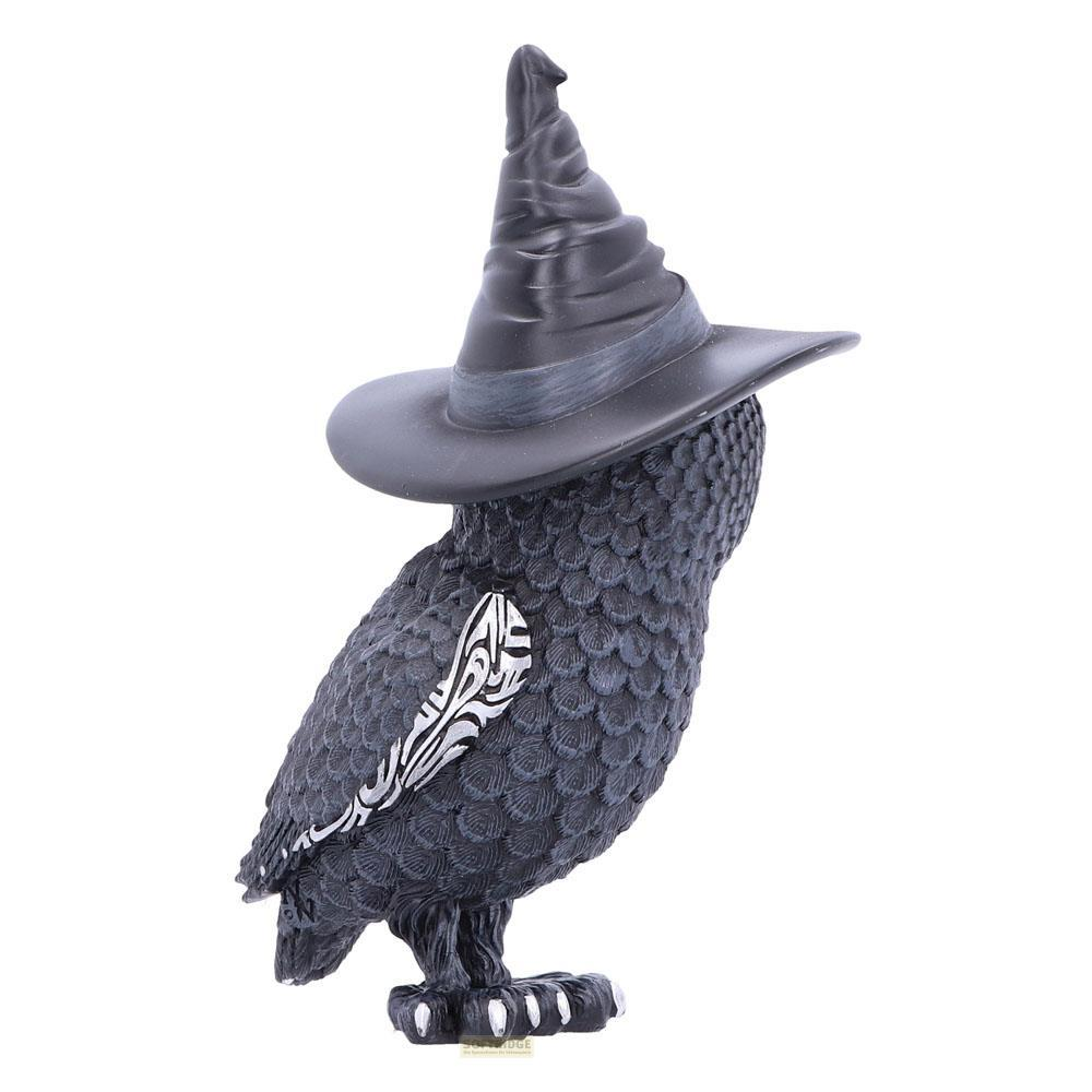 Schwarze Eulenfigur mit Hexenhut und silbernen Akzenten auf weißem Hintergrund.