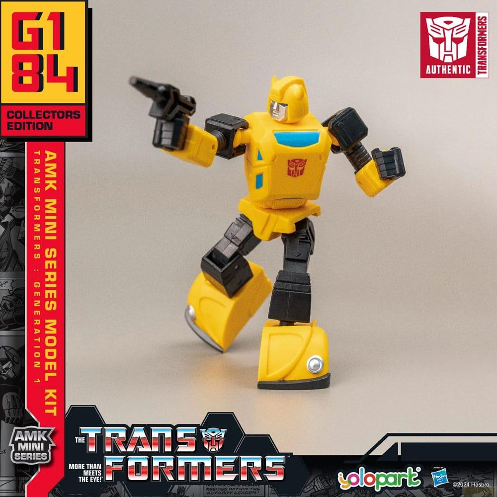 Gelber Transformer-Figur mit schwarzen Akzenten, hält eine Pistole.