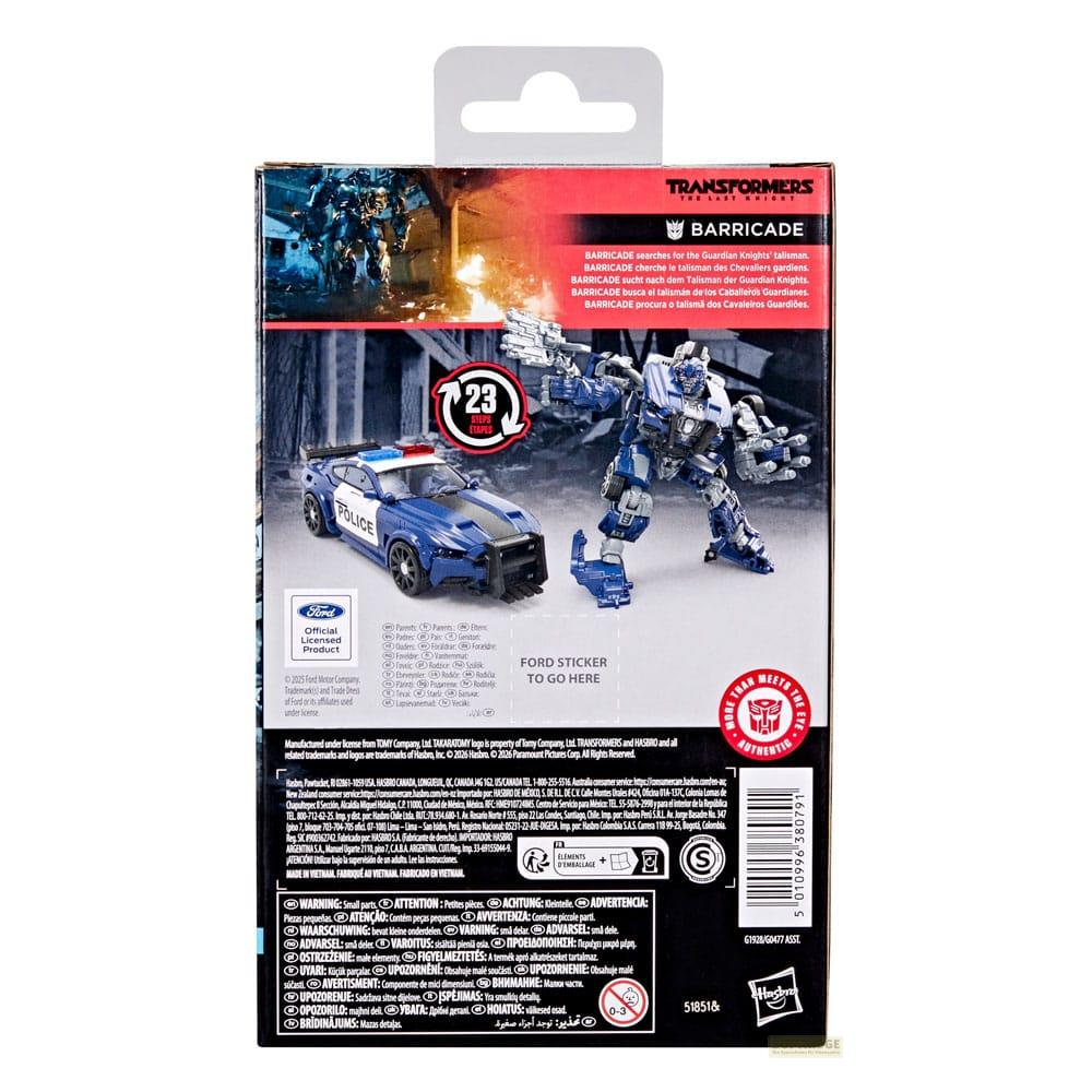 Action figure Transformers Barricade con auto della polizia e sfondo.