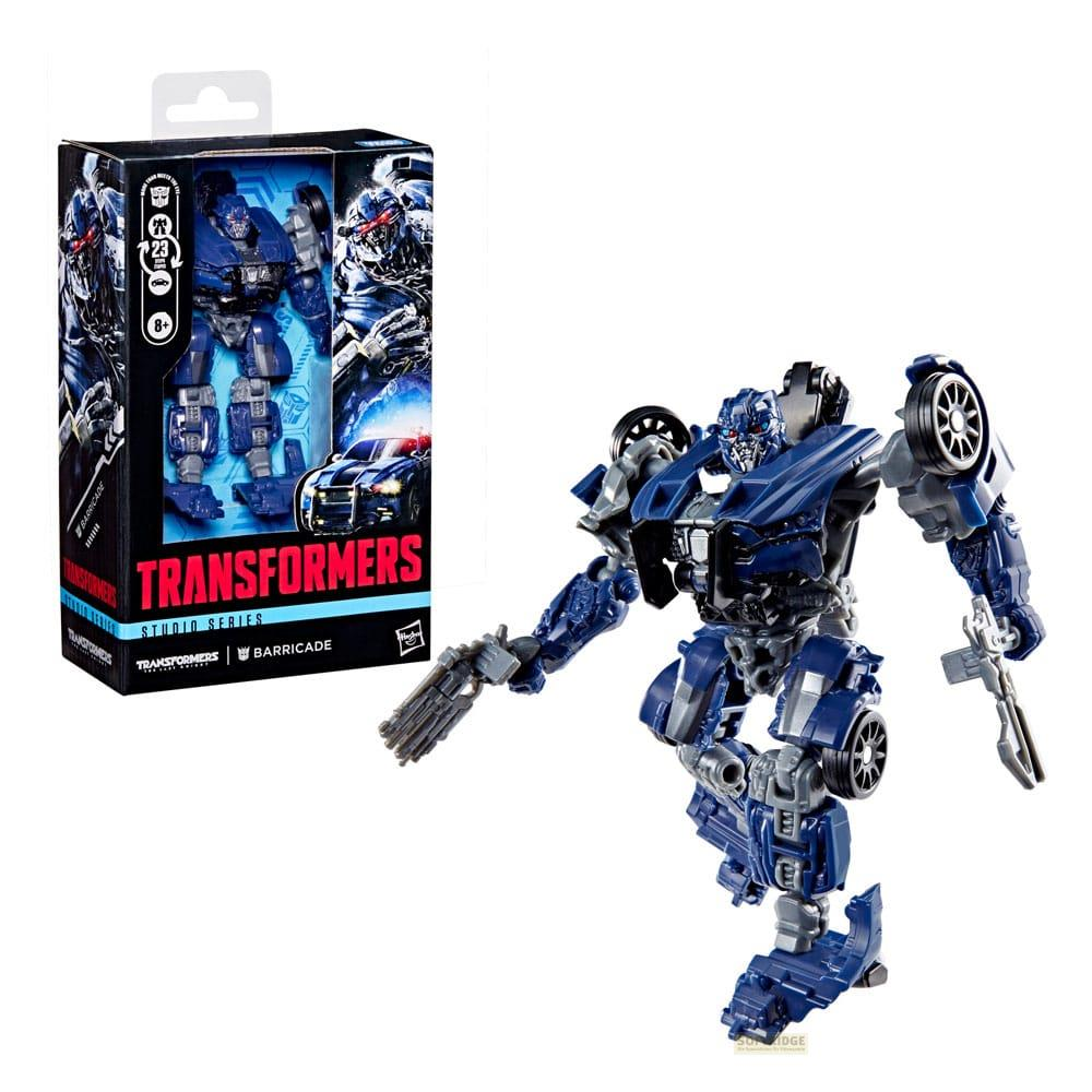Un robot blu Transformers accanto alla sua confezione.